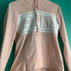A light pink PINK Victoria’s Secret Sweatshirt